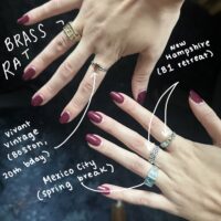 six rings, labeled with where I bought them